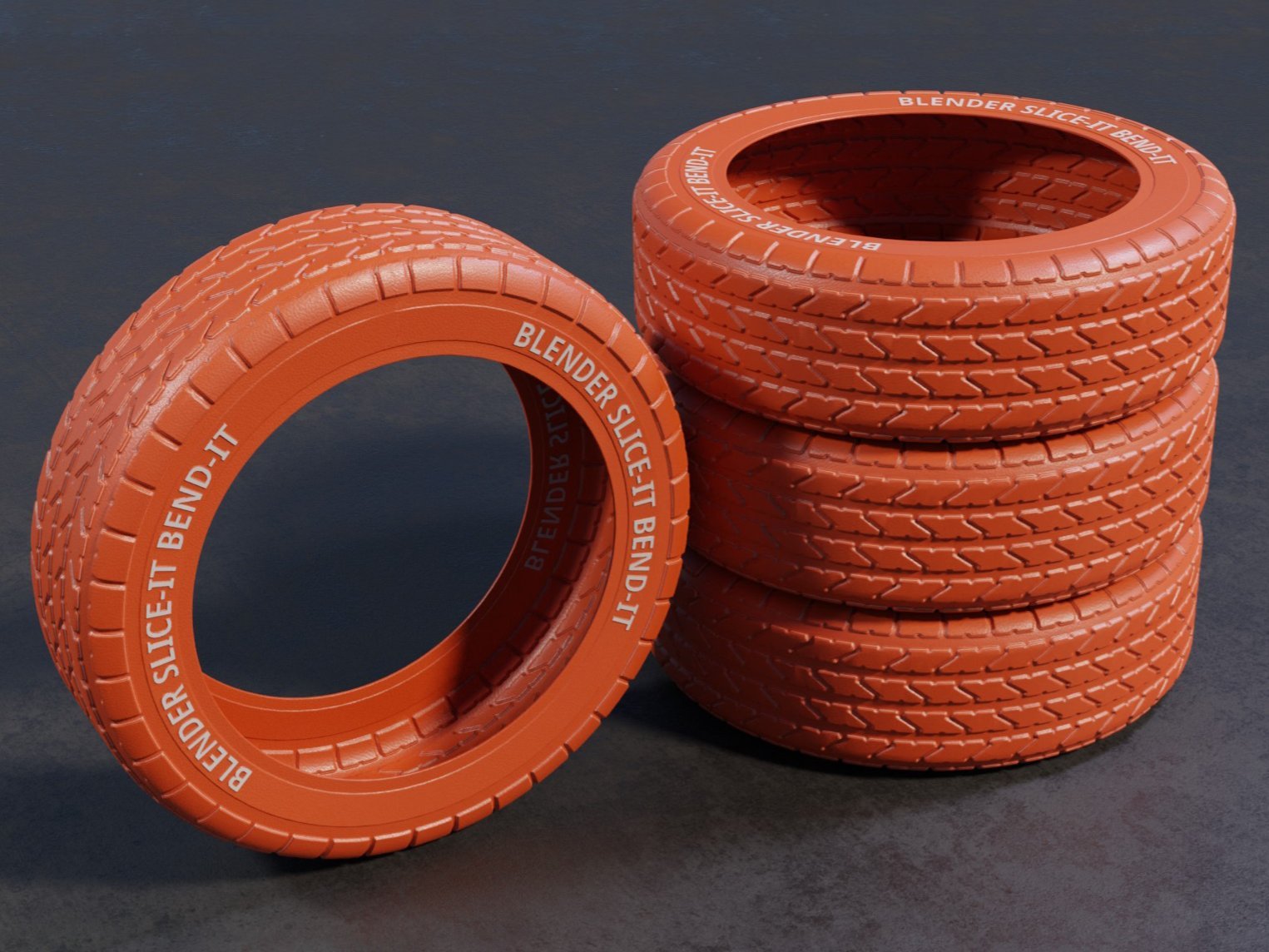 Four orange tires sliced and bent with Slice+Bend — one leaning against a stack of three